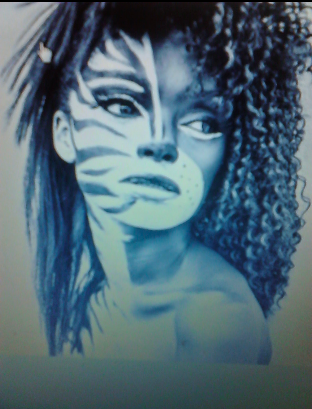A woman with a zebra print on her face