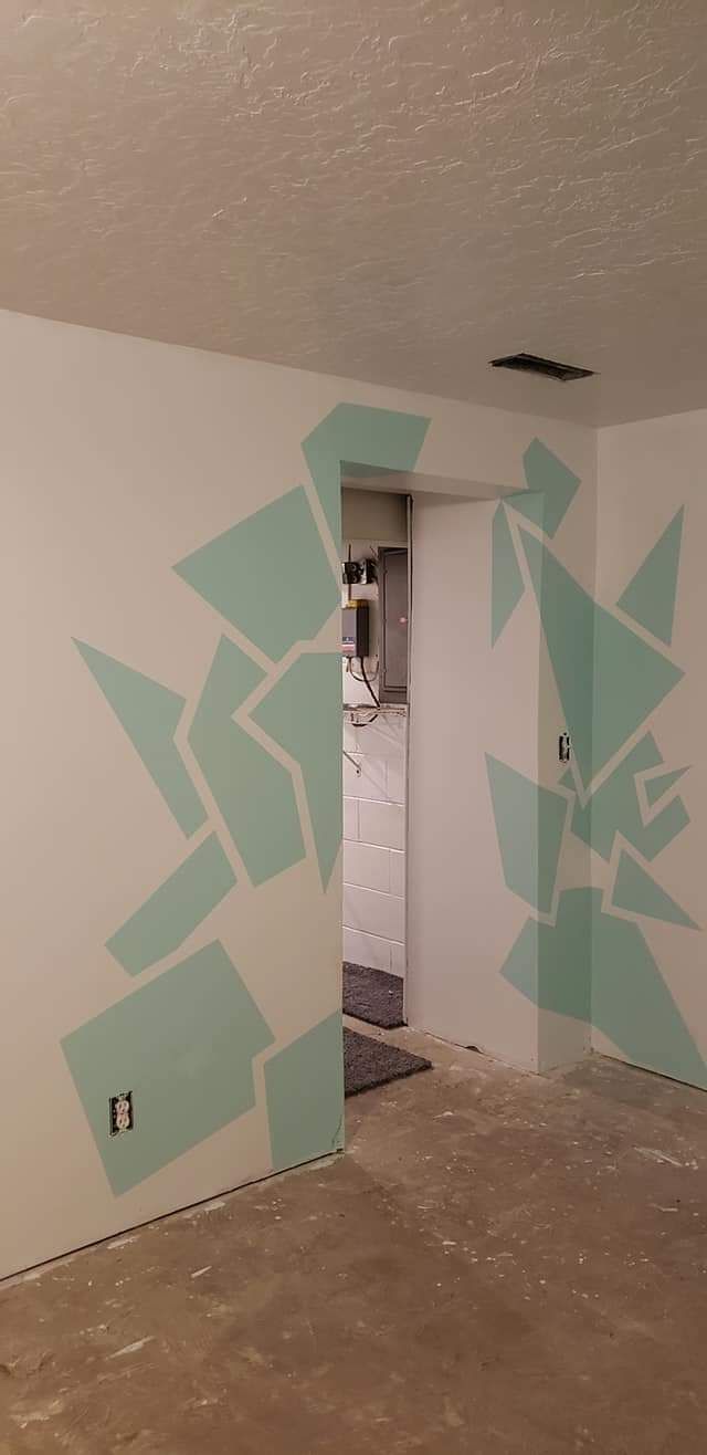 A custom painted wall in Mount Pleasant, MI by Altrade Creations