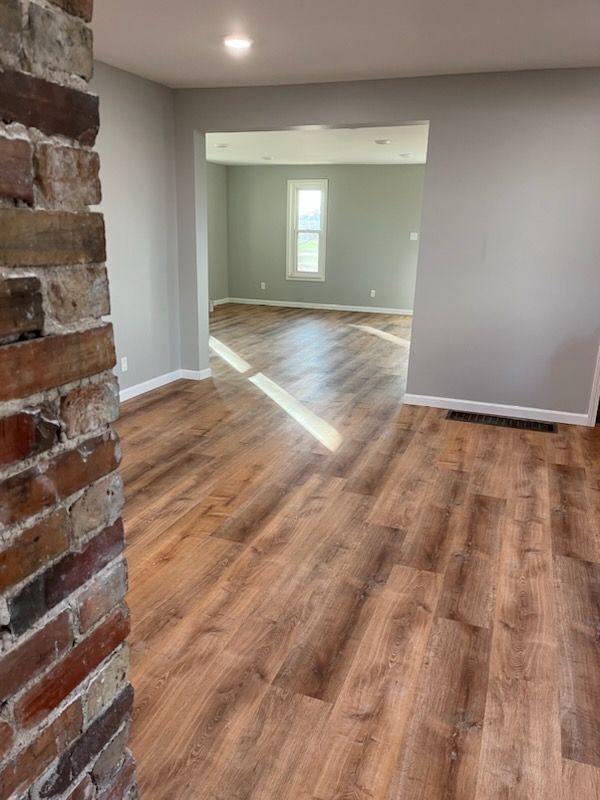 A flooring installation in Mount Pleasant, MI by Altrade Creations