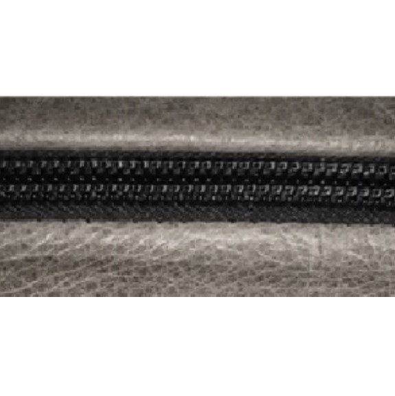 De ritsnaad in zwart blok biedt een strakke, moderne uitstraling, met een elegante afwerking die een stijlvol accent .