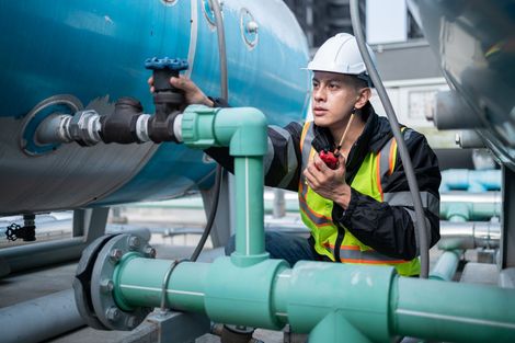 steam tech boiler worker repairing 