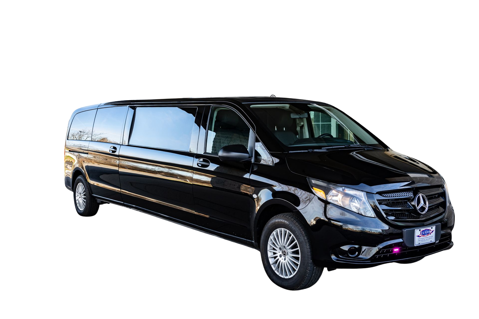 A black mercedes van is parked on a white background.