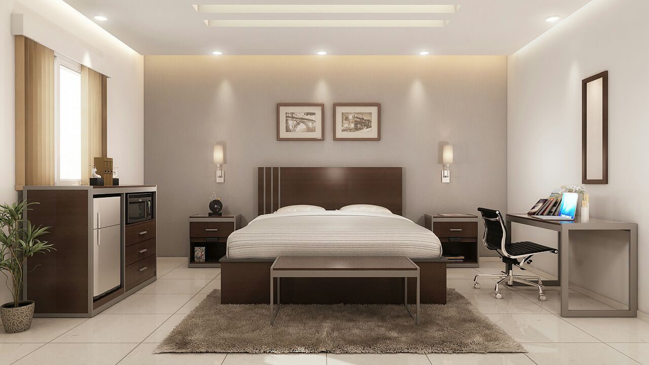 the Dickson Motif Collection guestroom shown in Cocobala laminate and silver powder coated metal frames.