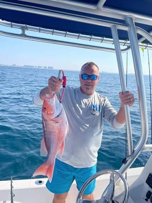 Man Caught A Fish — Destin, FL — Boat Up Fishing Rentals
