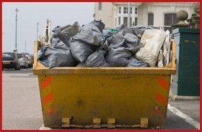 If you require skip hire in Coventry call 01788 541 066 yellow skip full of grey waste bags on a street