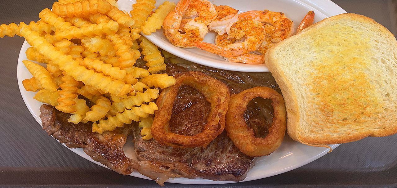 12oz Choice Ribeye with Choice of Broiled or Fried Jumbo Shrimp