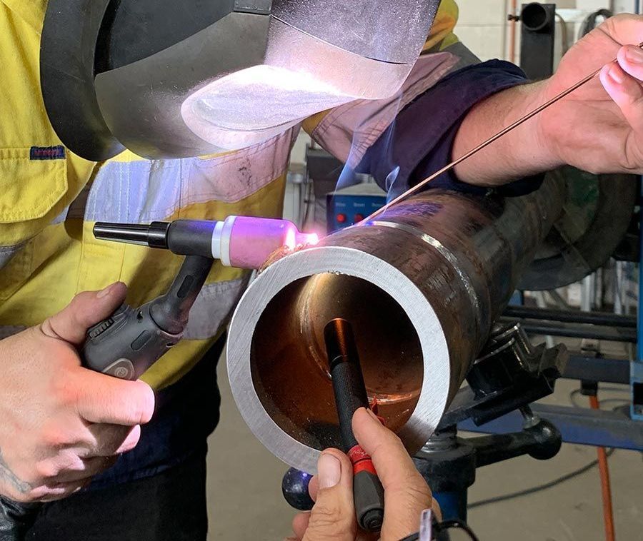 close-up of welding work on a steel pipe in Cairns