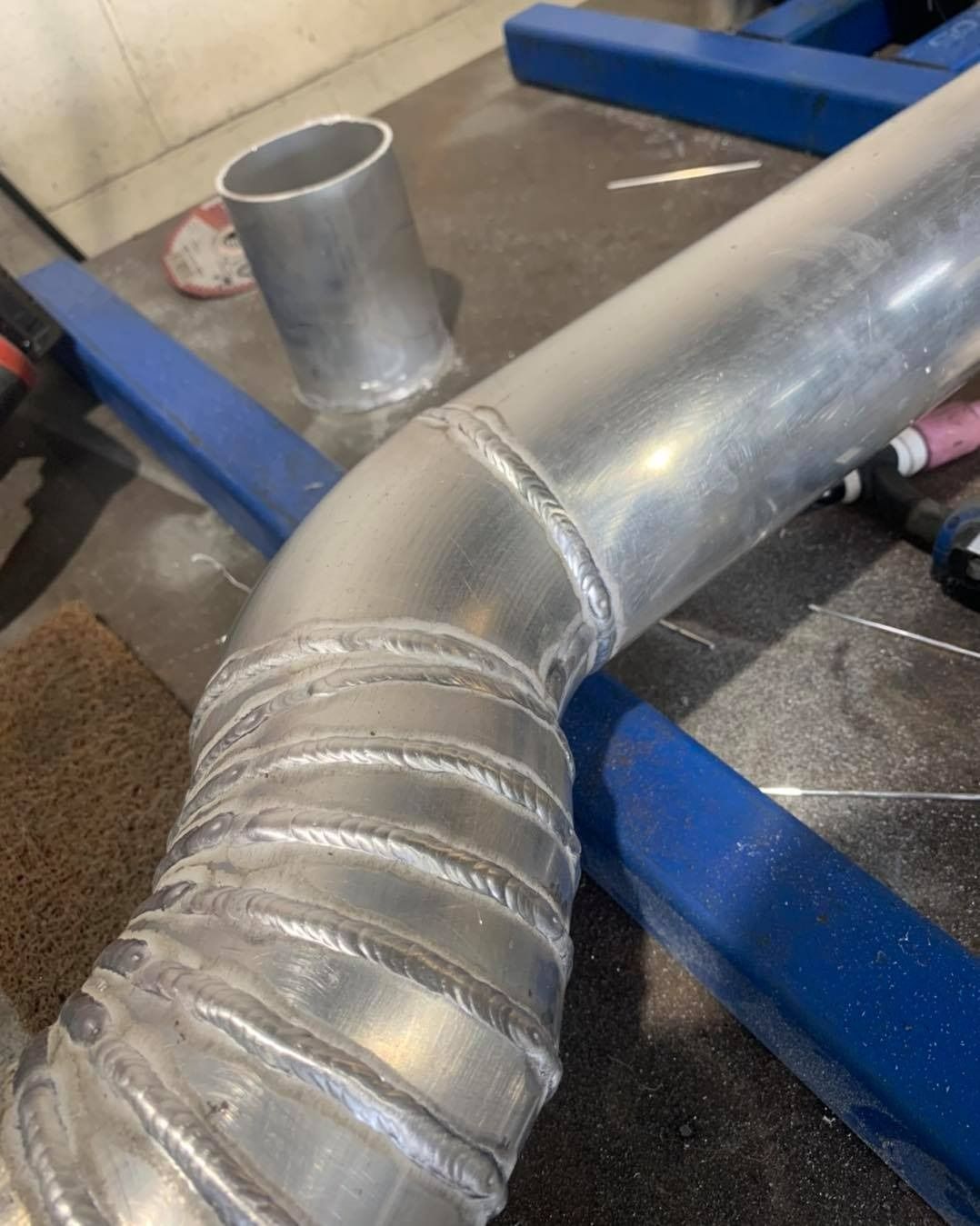 A Close Up Of A Metal Pipe Sitting On Top Of A Table — Hanby Welding & Engineering In Portsmith, QLD