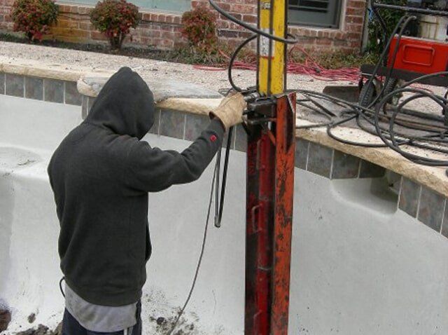working on pier - foundation repair and inspection in Garland, TX