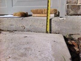 worker check foundation - foundation repair and inspection in Garland, TX worker check foundation - foundation repair and inspection in Garland, TX
