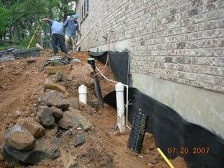 inspecting foundation - foundation repair and inspection in Garland, TX