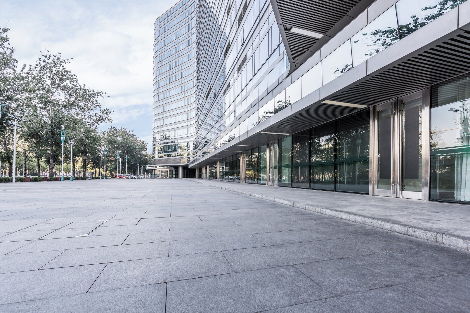 House and Magnifying Glass — Tampa, FL — Paul & Associates Real Estate Services, Inc.