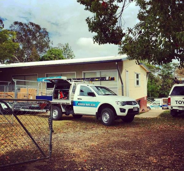 A Toyota Truck Is Parked In Front Of A House — Coolmech In Gympie, QLD