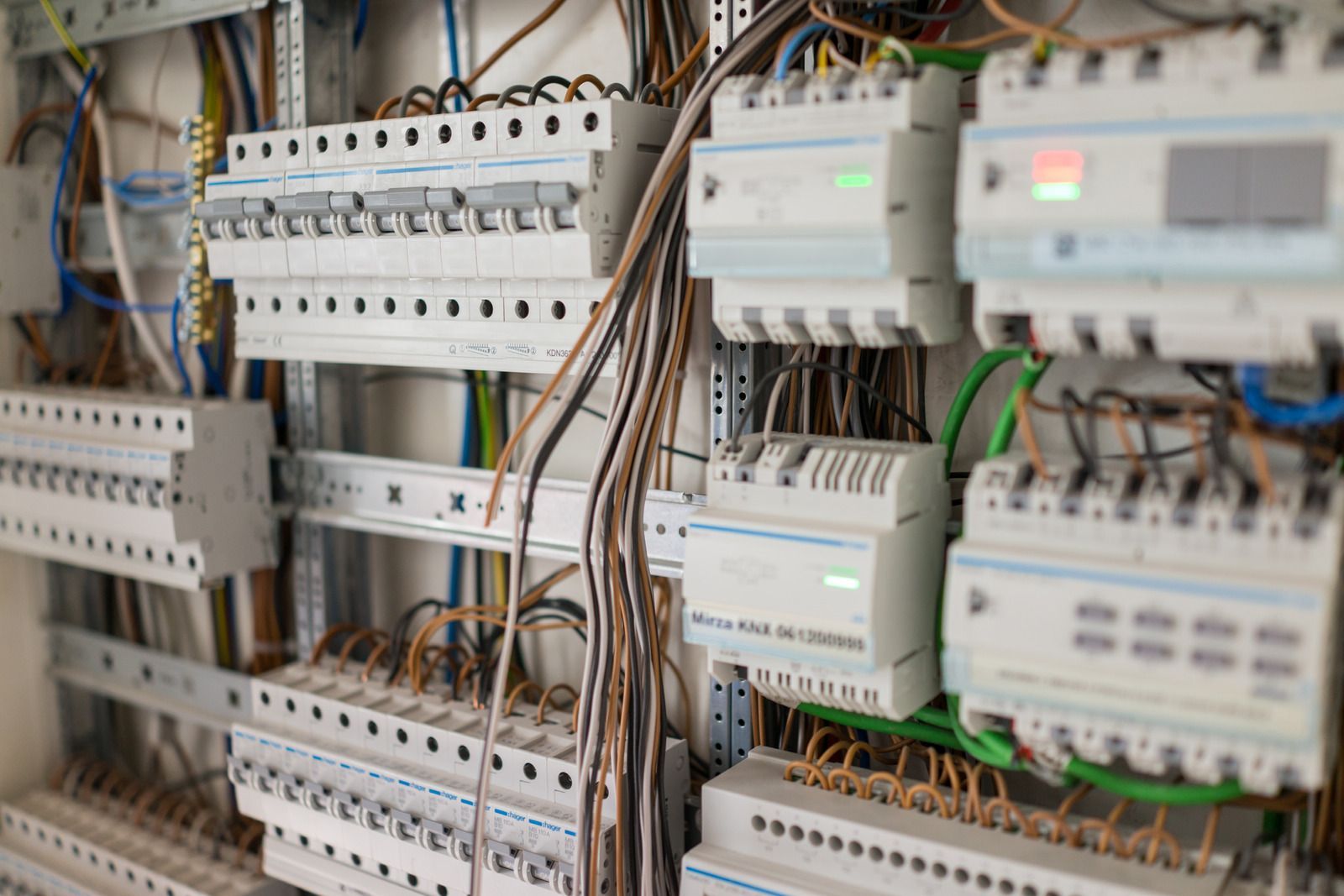 There are a lot of wires coming out of the electrical box.