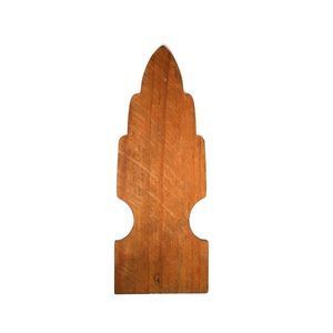 A wooden fence post with a pointed top on a white background.