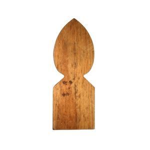 A wooden fence picket with a hole in the middle on a white background.