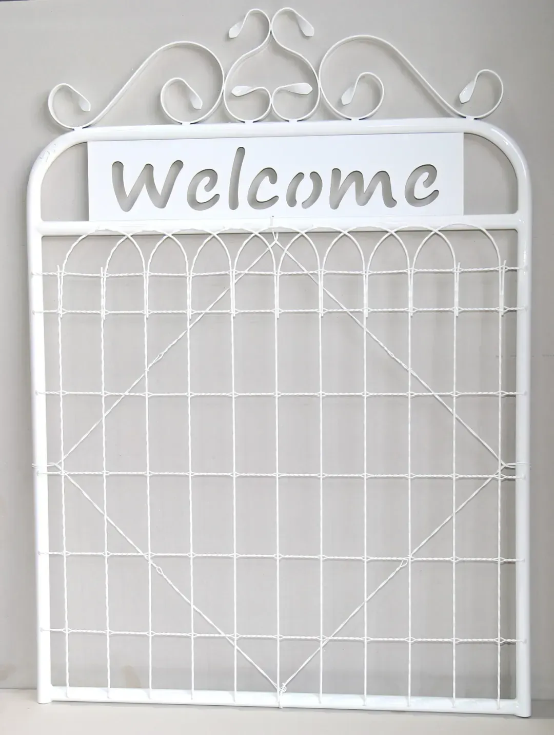 A white welcome gate from Big Red Heritage Wire and Gates
