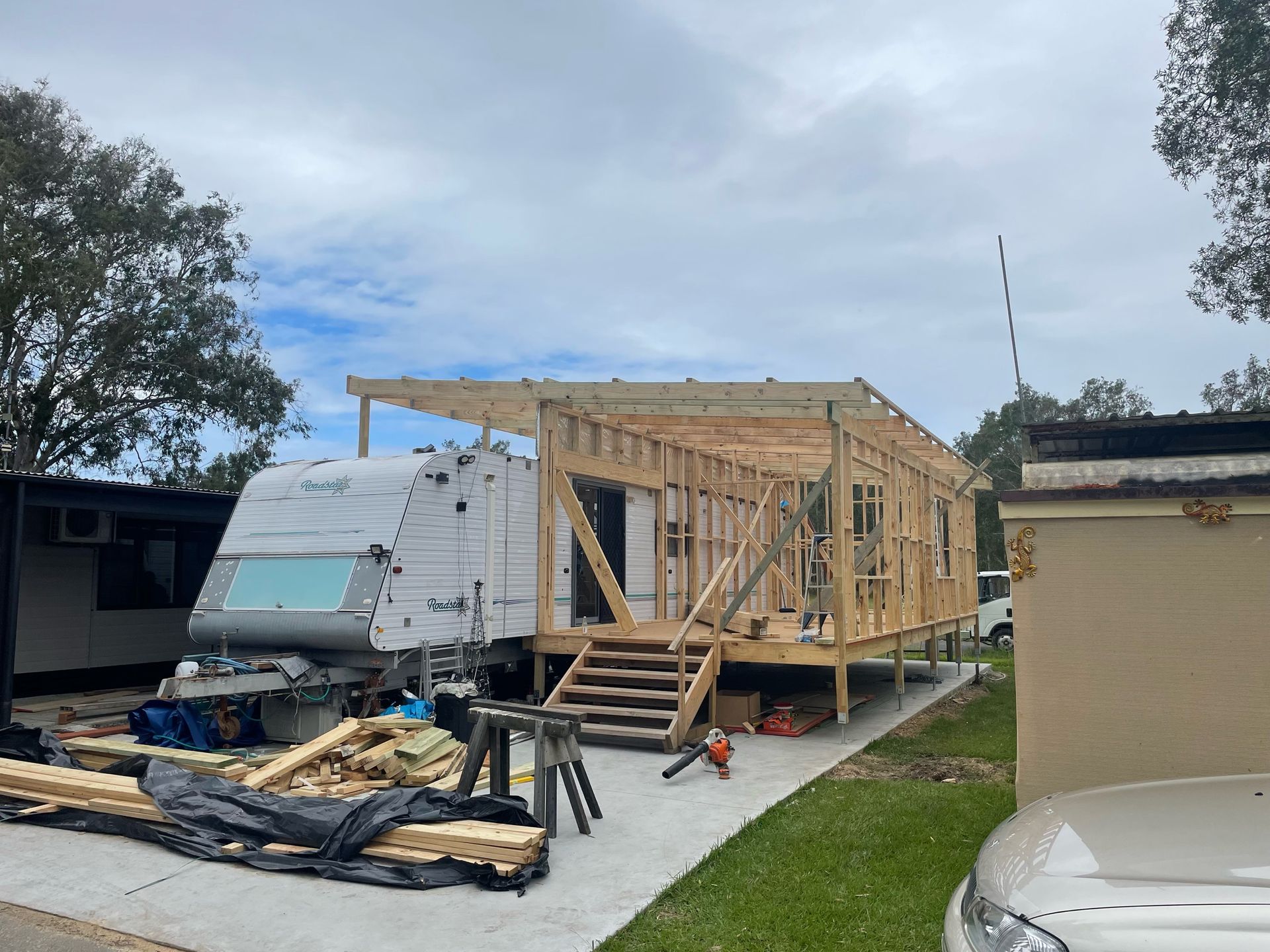 A Wooden Frame next to a caravan — J’s Concreting & Carpentry in Port Macquarie, NSW