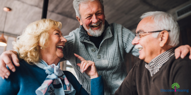 older man socializing with friends.