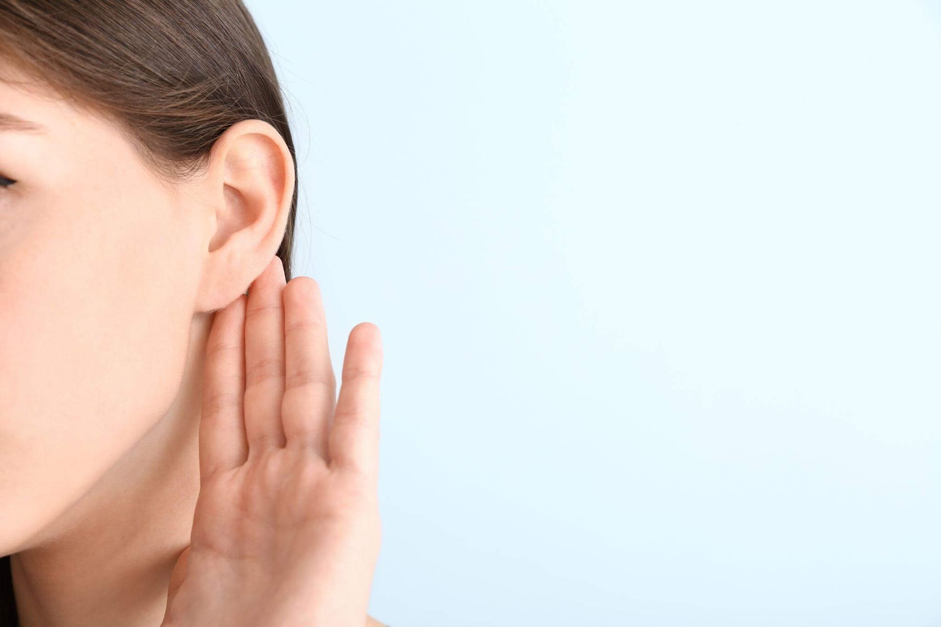 woman experiencing hearing impairment
