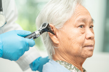 older woman receiving a hearing evaluation at Discover Hearing in St. Albert