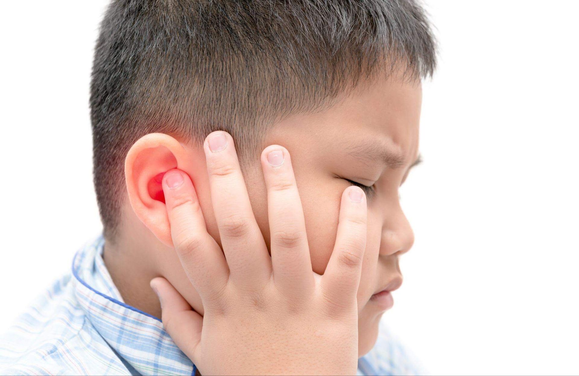 child suffering from ear infection