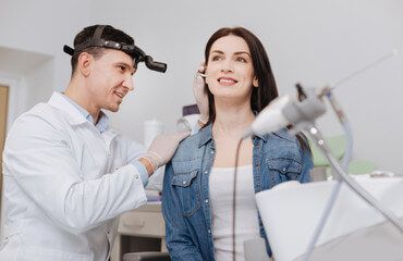 man experiencing ear pain
