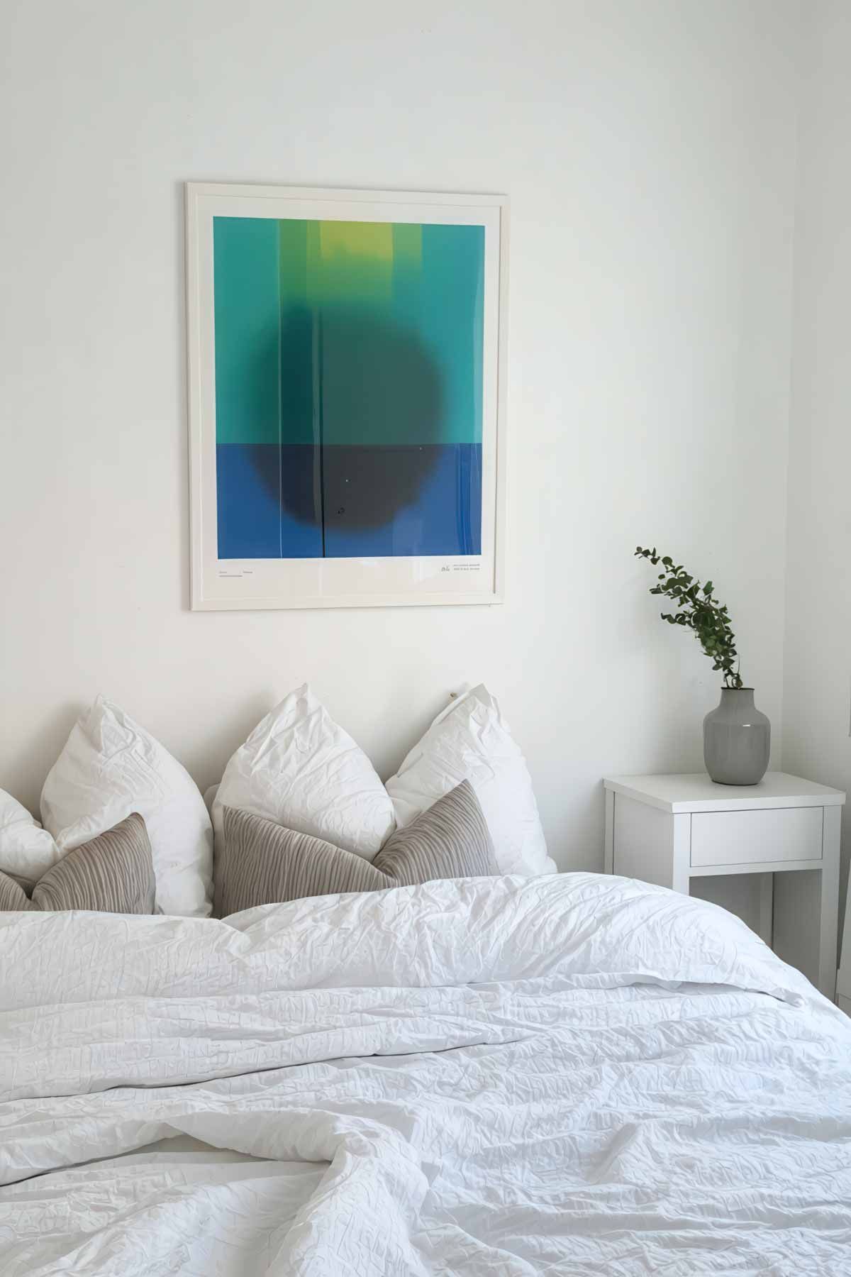 Minimalist-Bedroom-Design-Bold-Artwork Minimalist white bedroom with bold art on the wall