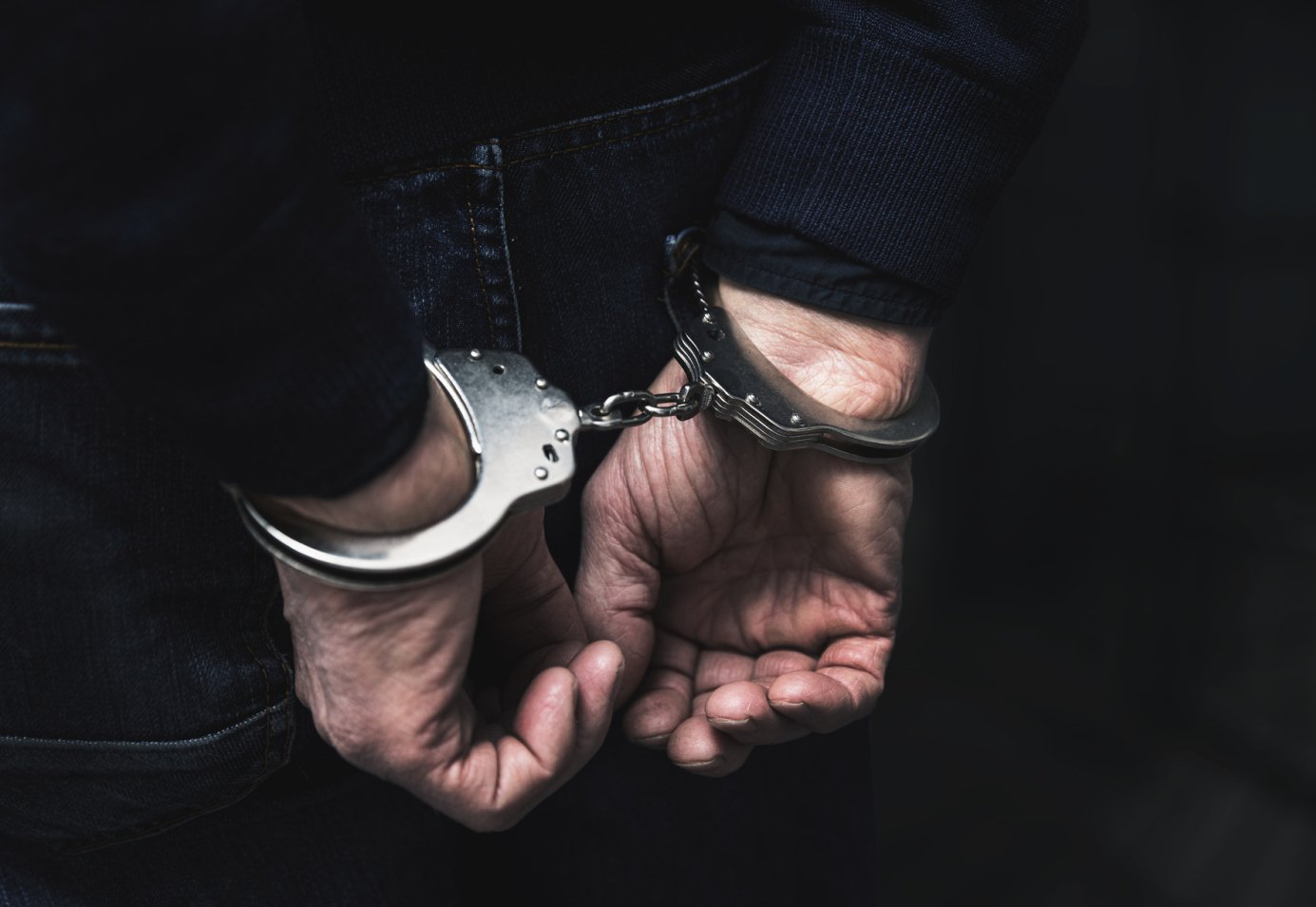Image of person in handcuffs