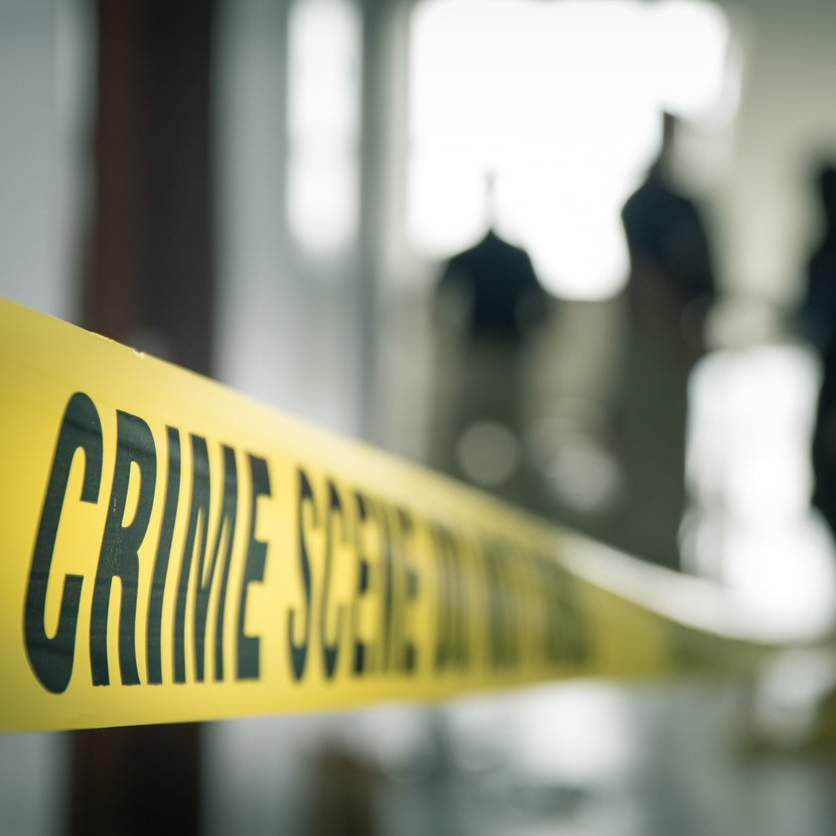 Crime scene tape across crime scene