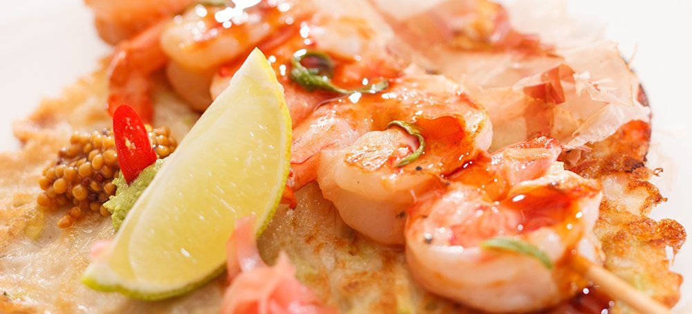 Kebab shrimp served with lemon in New York, NY