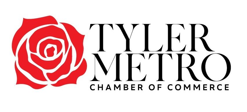 The tyler metro chamber of commerce logo has a red rose on it.
