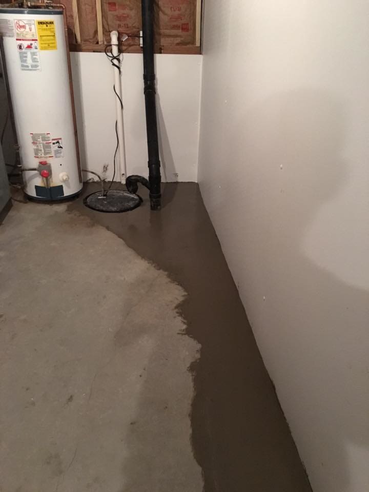 Cemented Black Sump Pump — Foundation Repairs in Dr. Buckner, MO