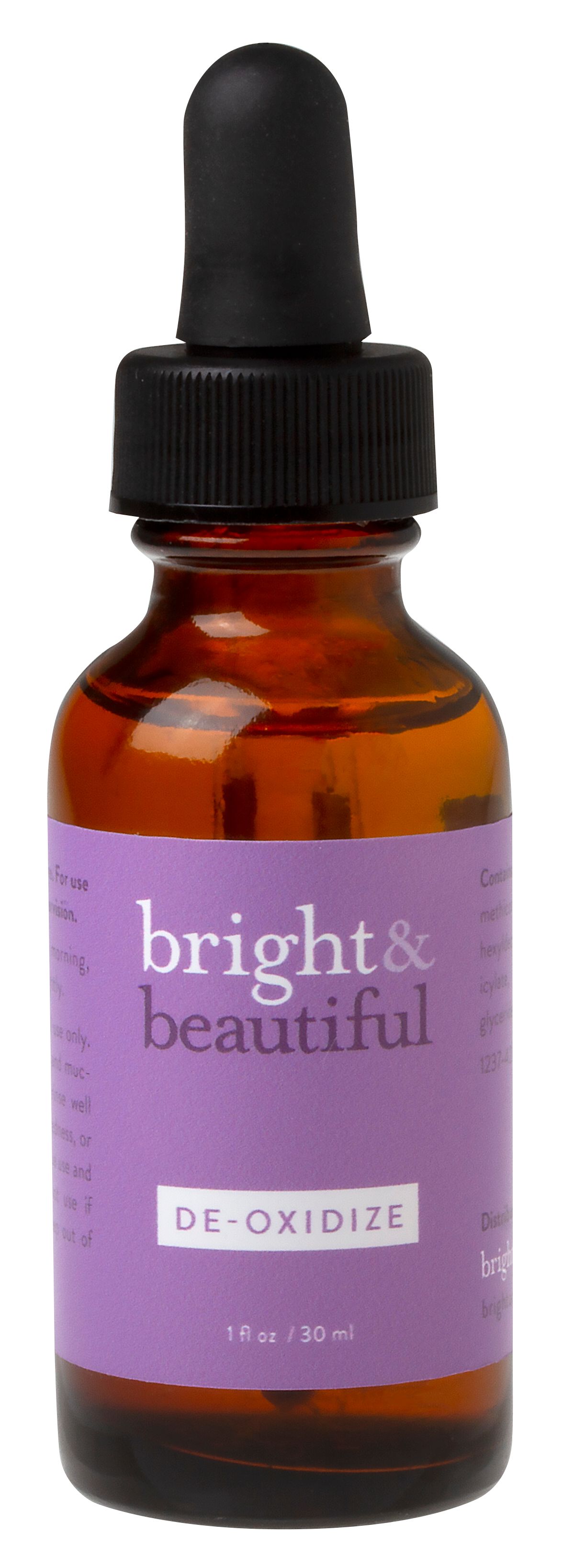 A bottle of bright and beautiful essential oil with a dropper