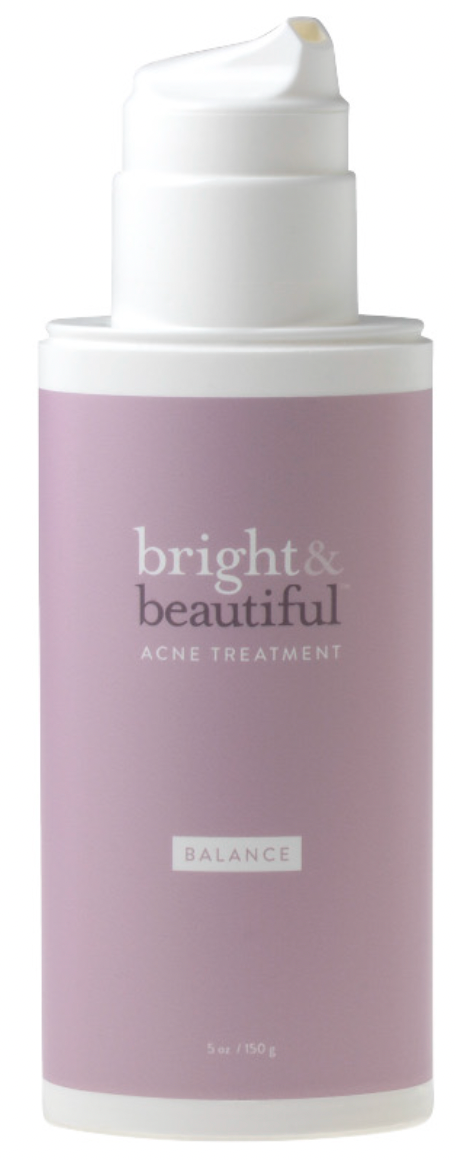 A bottle of bright & beautiful acne treatment on a white background.