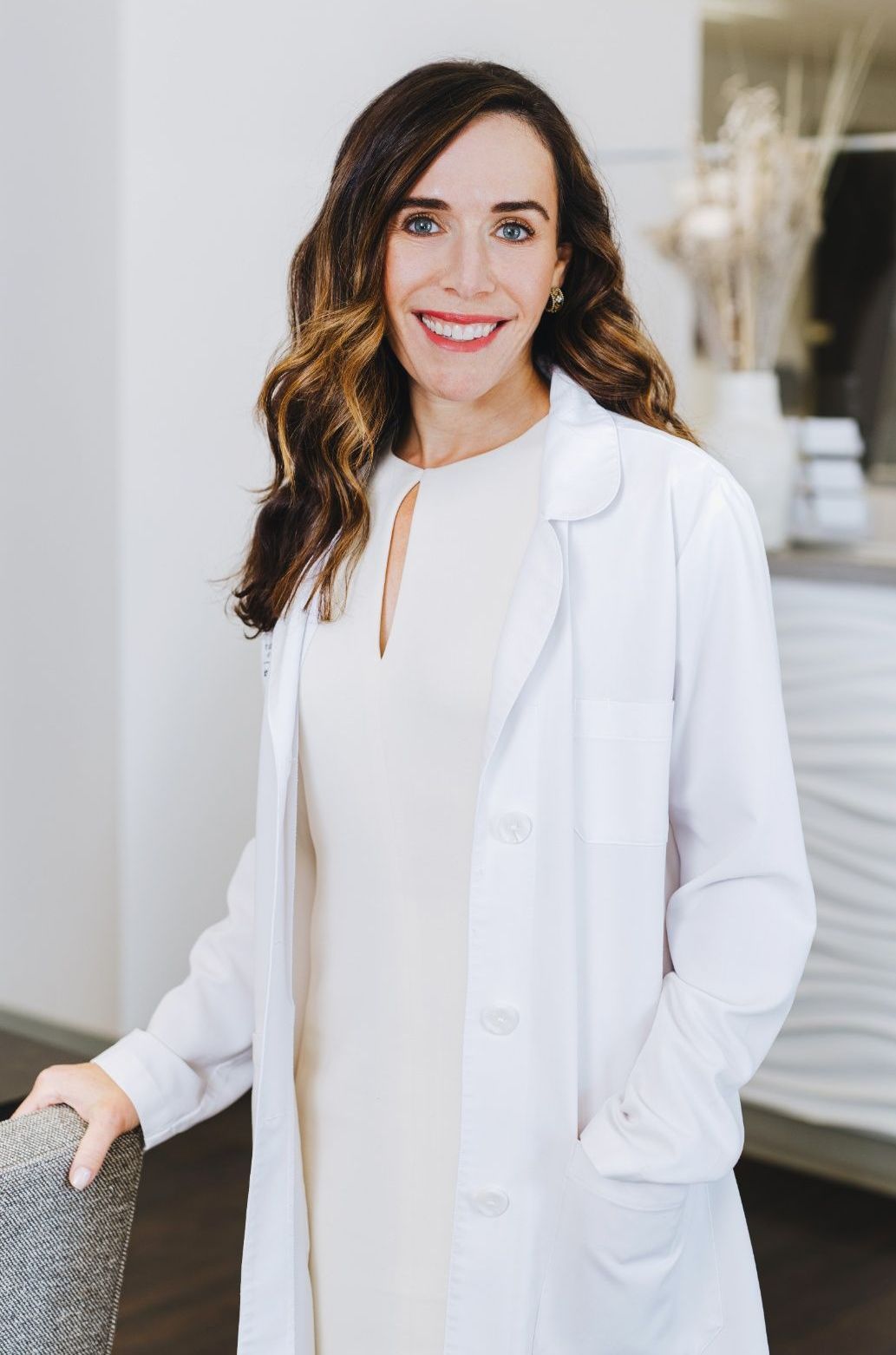 a portrait of Dr. Jill Javahery, Board-Certified Dermatologist wearing a blouse shirt