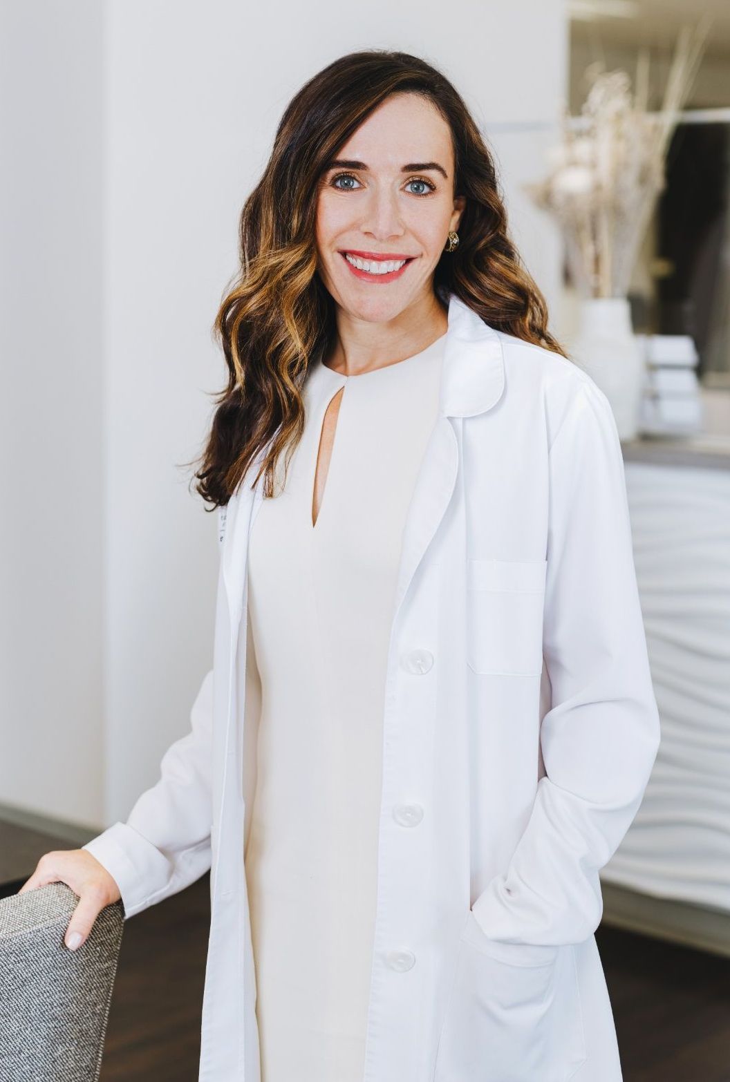 a portrait of Dr. Jill Javahery, Board-Certified Dermatologist wearing a blouse shirt