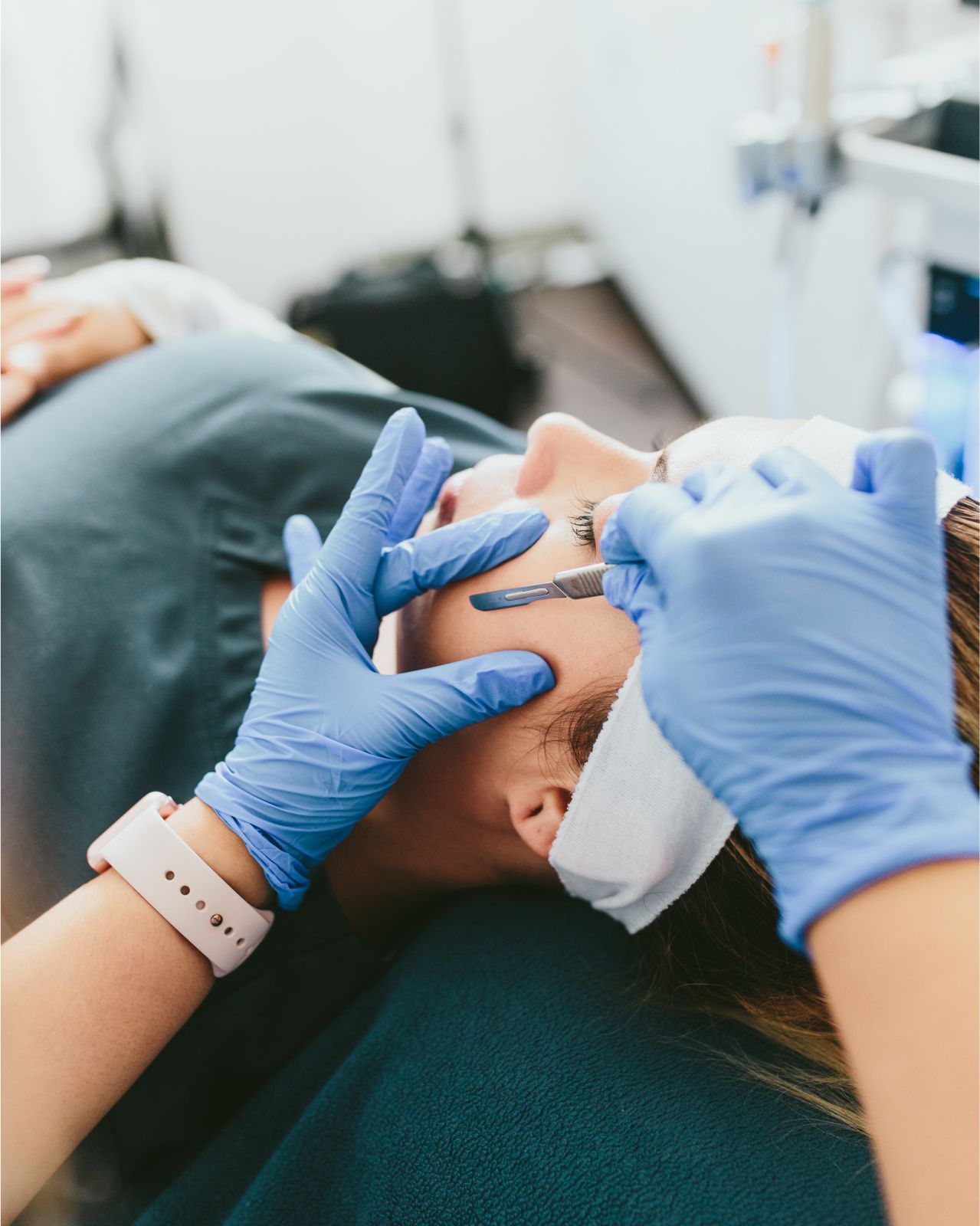 close of shot of woman during her demaplaning procedure