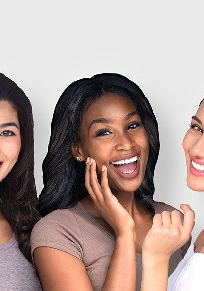 Dentistry — Ladies with Healthy Teeth Smiling in Charlotte, NC