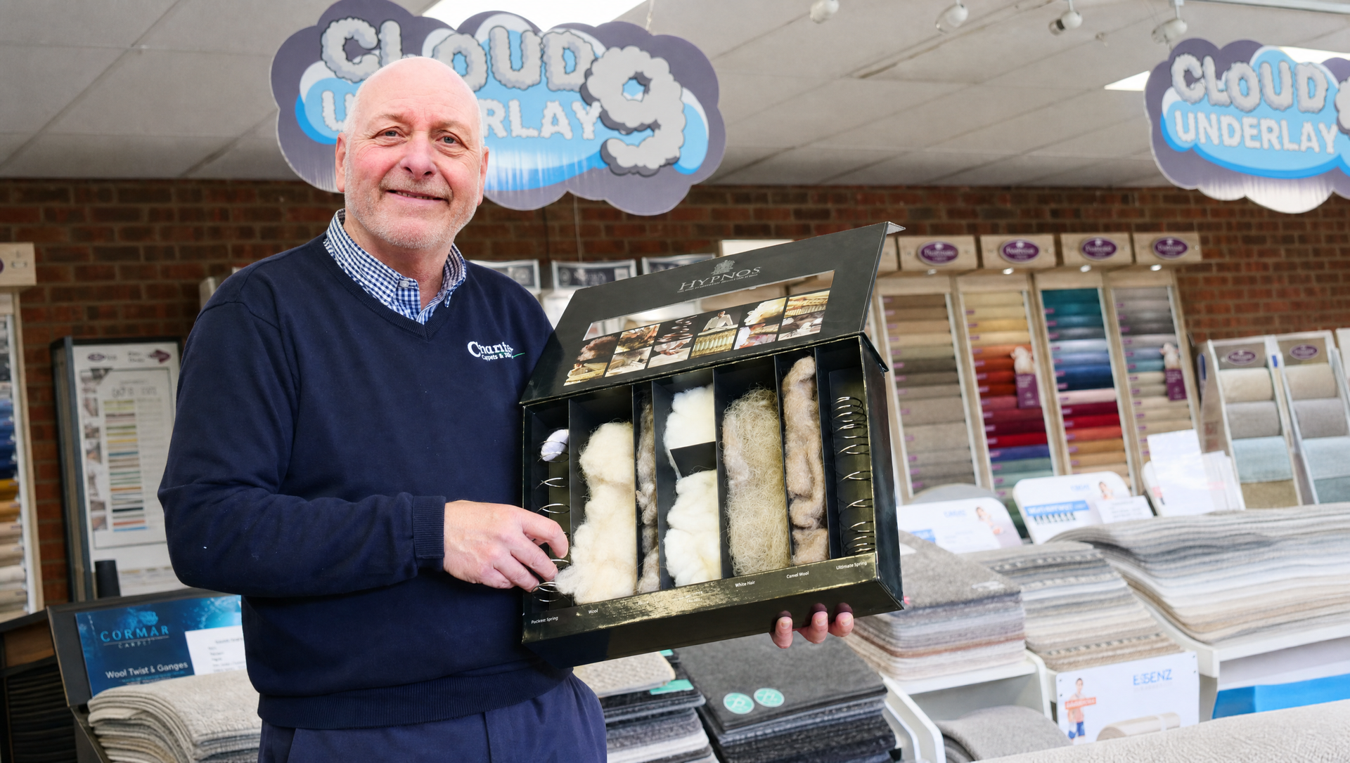 Chris Dyson, owner of Country Carpets & Beds, in his Hunmanby showroom - Yorkshire flooring and bed 