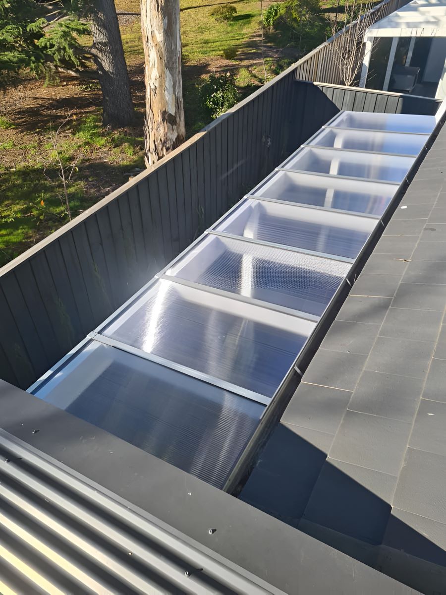 A Roof With a Lot of Windows and a Fence in the Background — Prime Built Group in Bowral, NSW
