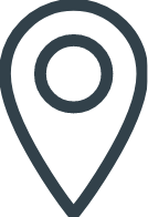 A map pin with a circle in the middle of it.