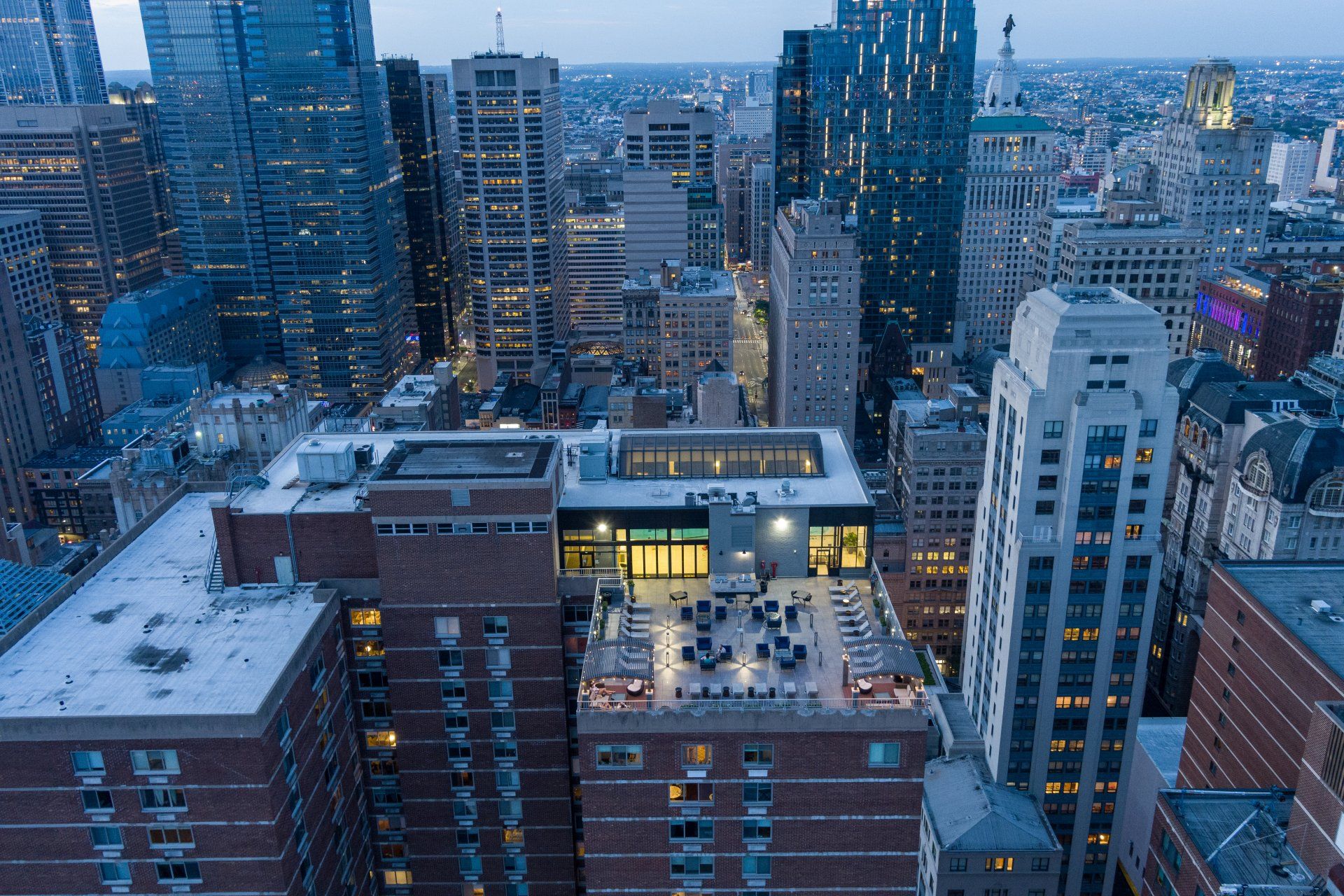 An aerial view of a city skyline at night