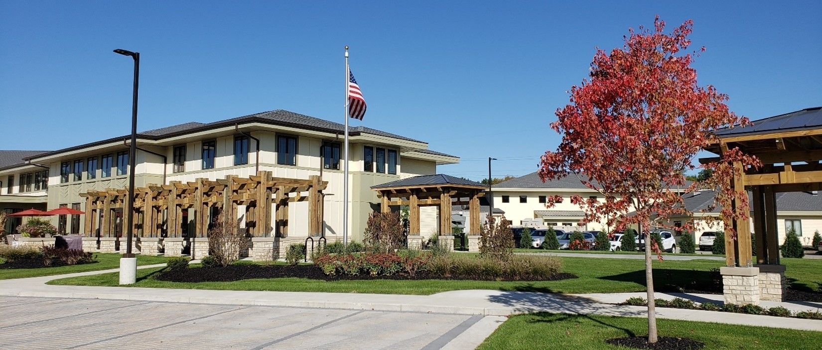 Housing With American Flag — Ames, IA — Howell Investment Finance