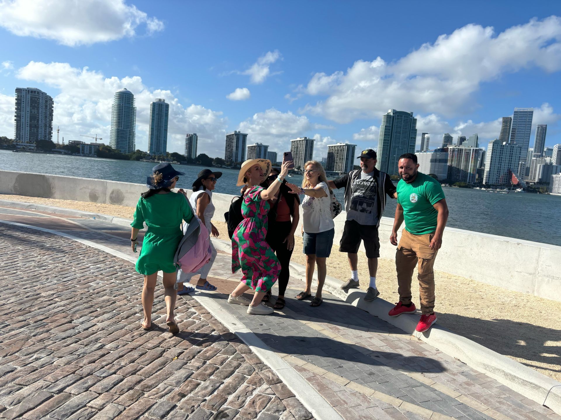 3.5 hours on the Miami 3 in 1 city tour with passengers taking photos with tour guide at the secret Miami Skyline photo spot 