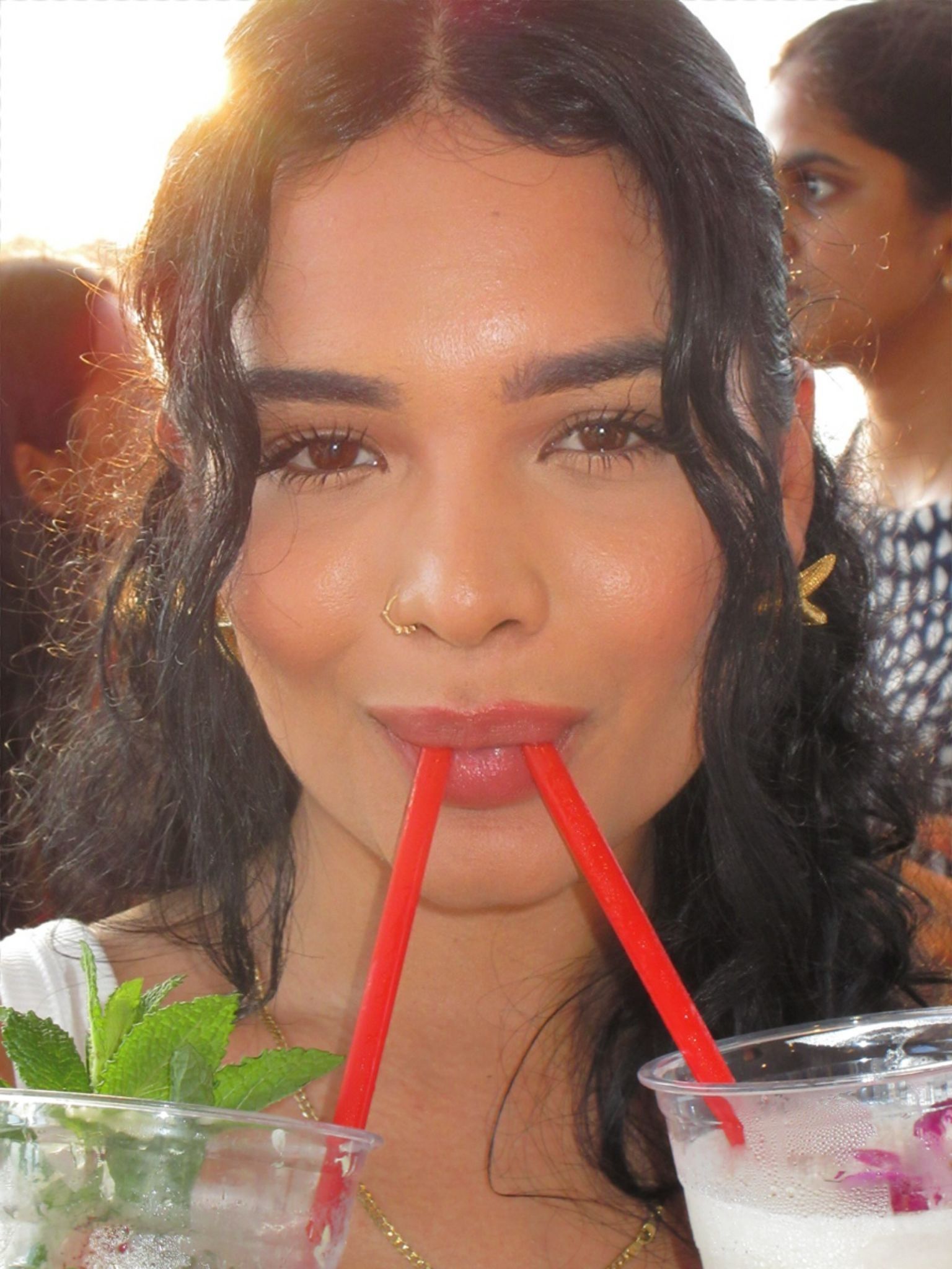 Florida woman enjoying mojitos on the Miami boat tour with the Florida Resident Discount