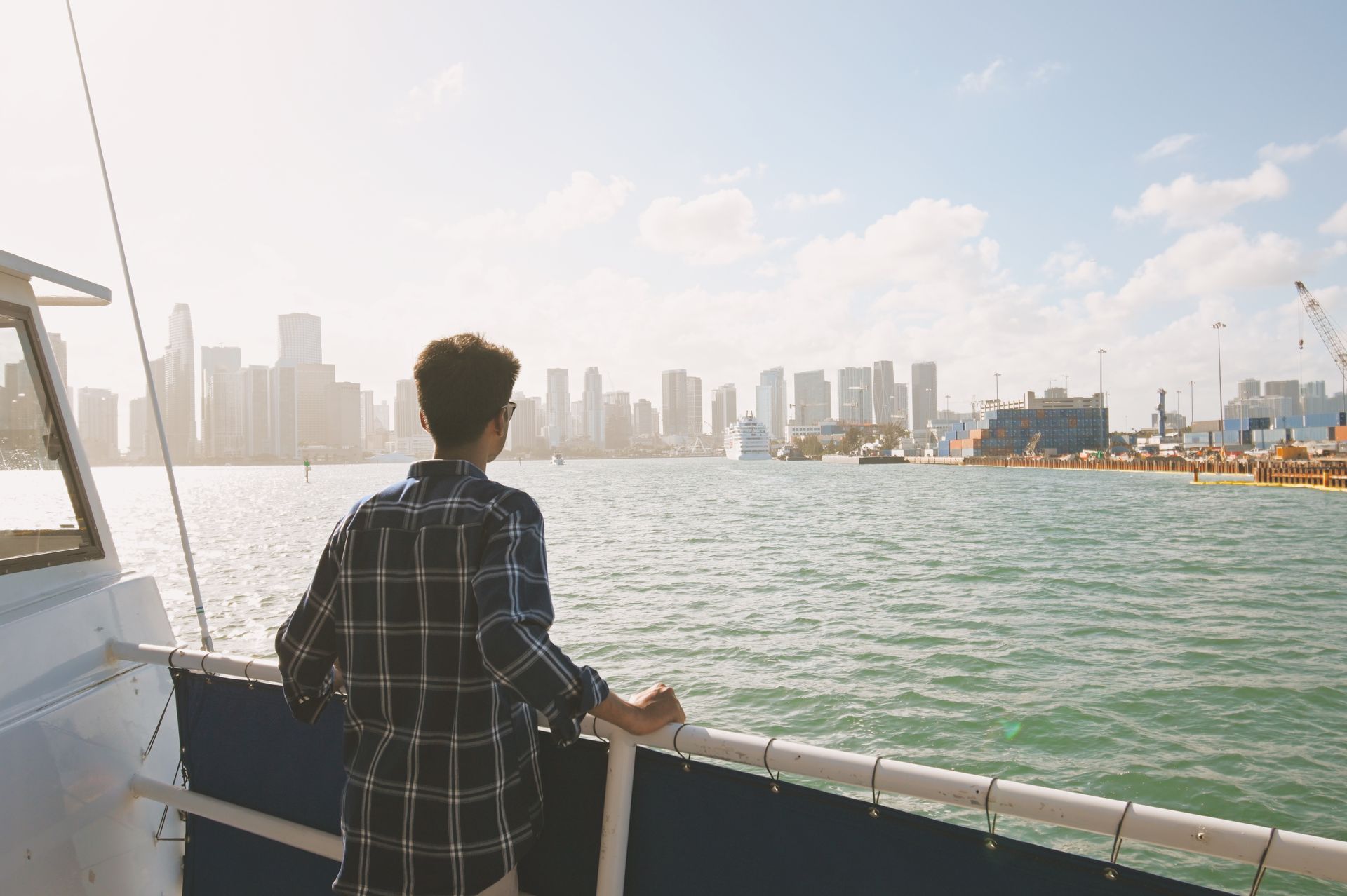 Passenger looking at the Miami Skyline from the Miami boat ride