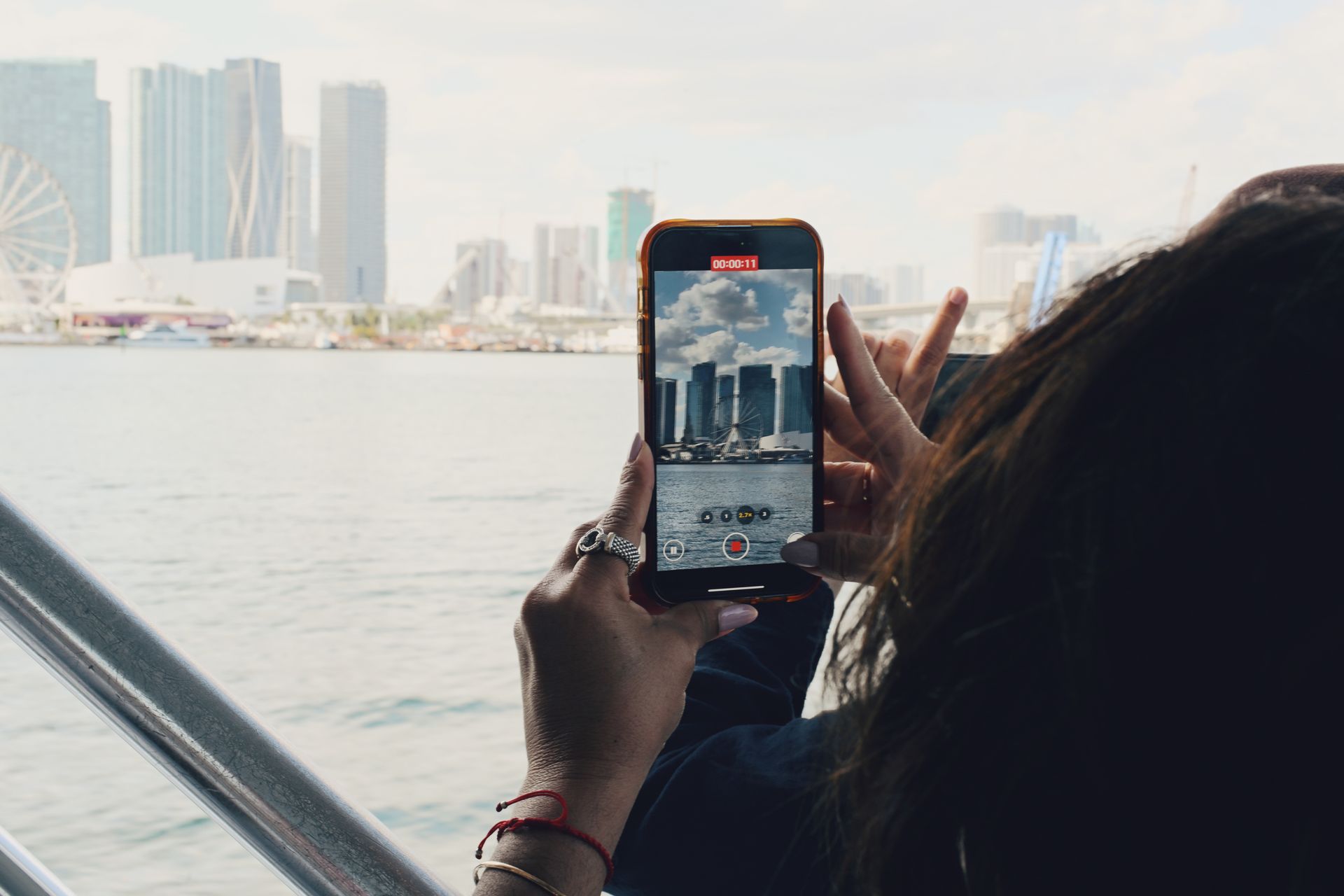 Guest taking photo of the Miami Skyline