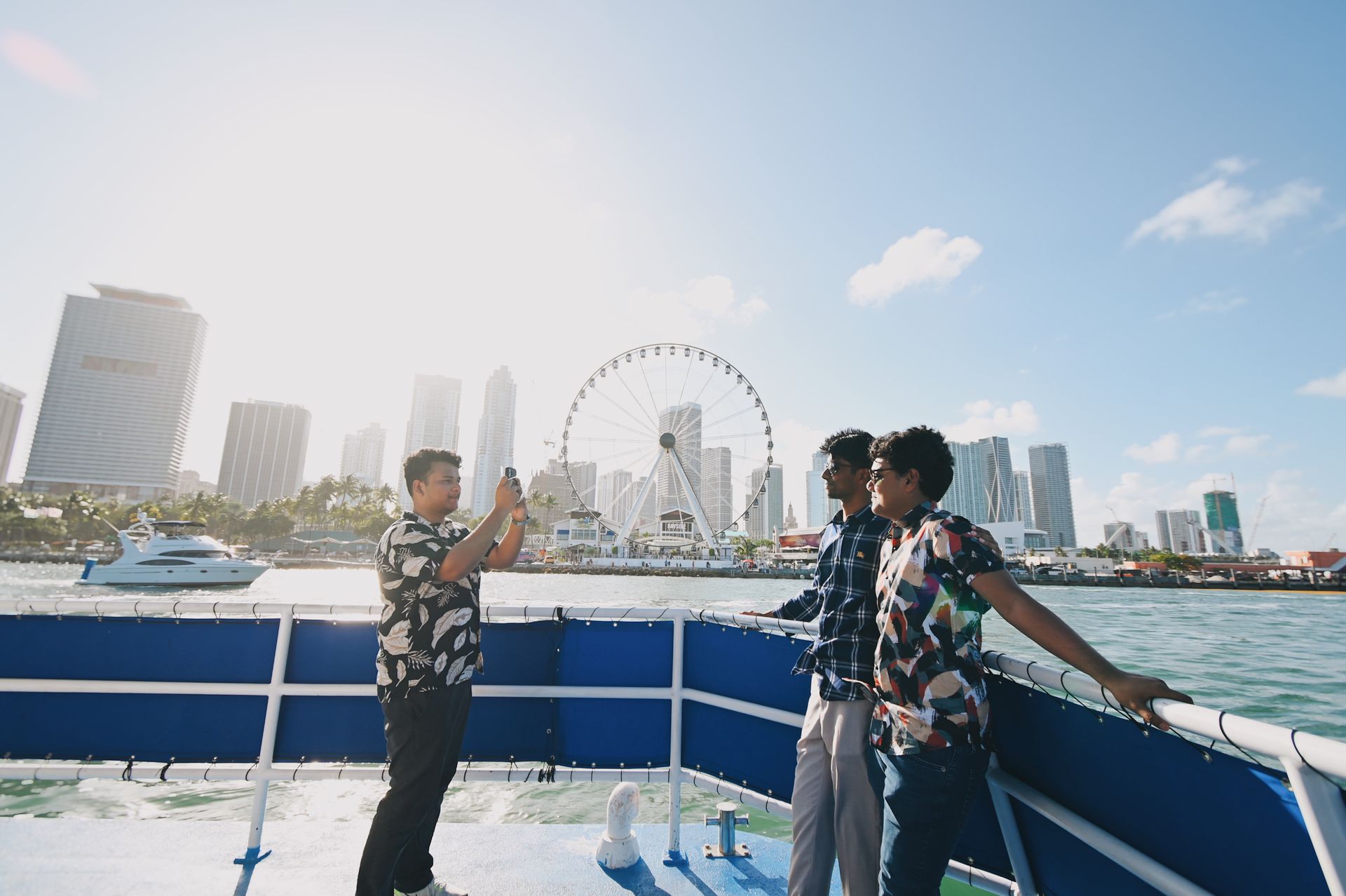 Passengers taking photo on boat tour from Bayside