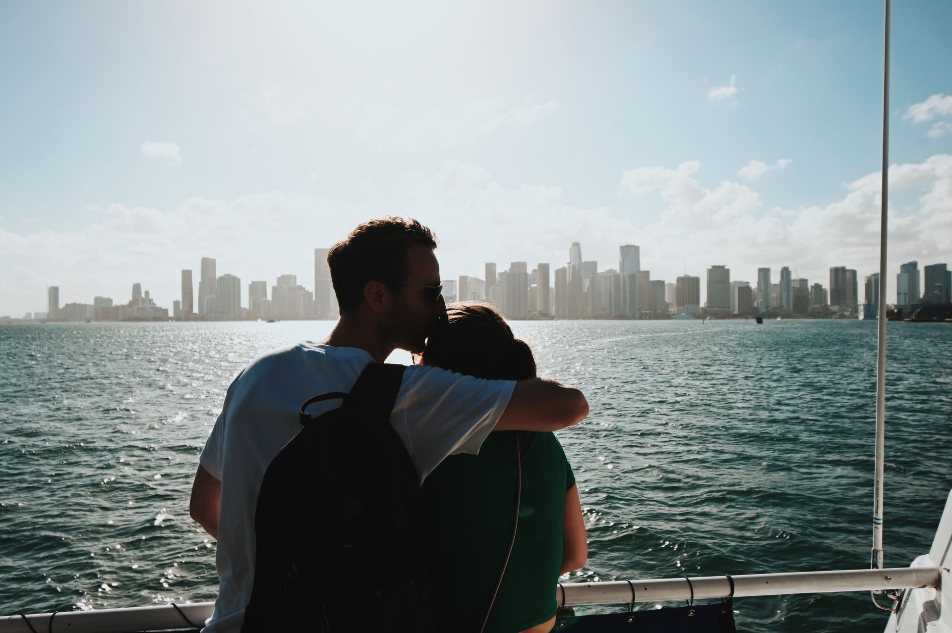 Couple on the Miami Boat tours with the Miami Skyline